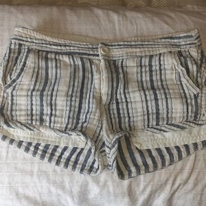 These blue and white stripped shorts are from Free People, and a size 2 in woman